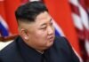 Kim Jong inspects multi-rocket test, warning America and South Korea