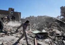 Iran plunges into mourning, funeral postponed amid rising death toll